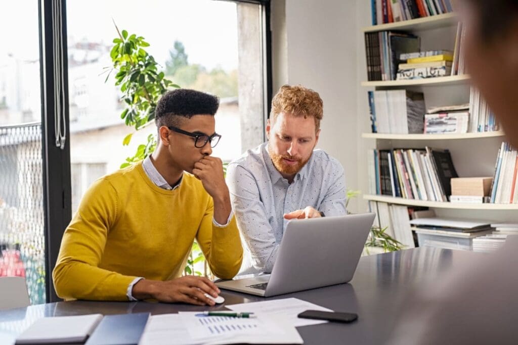 creative-business-people-working-on-laptop
